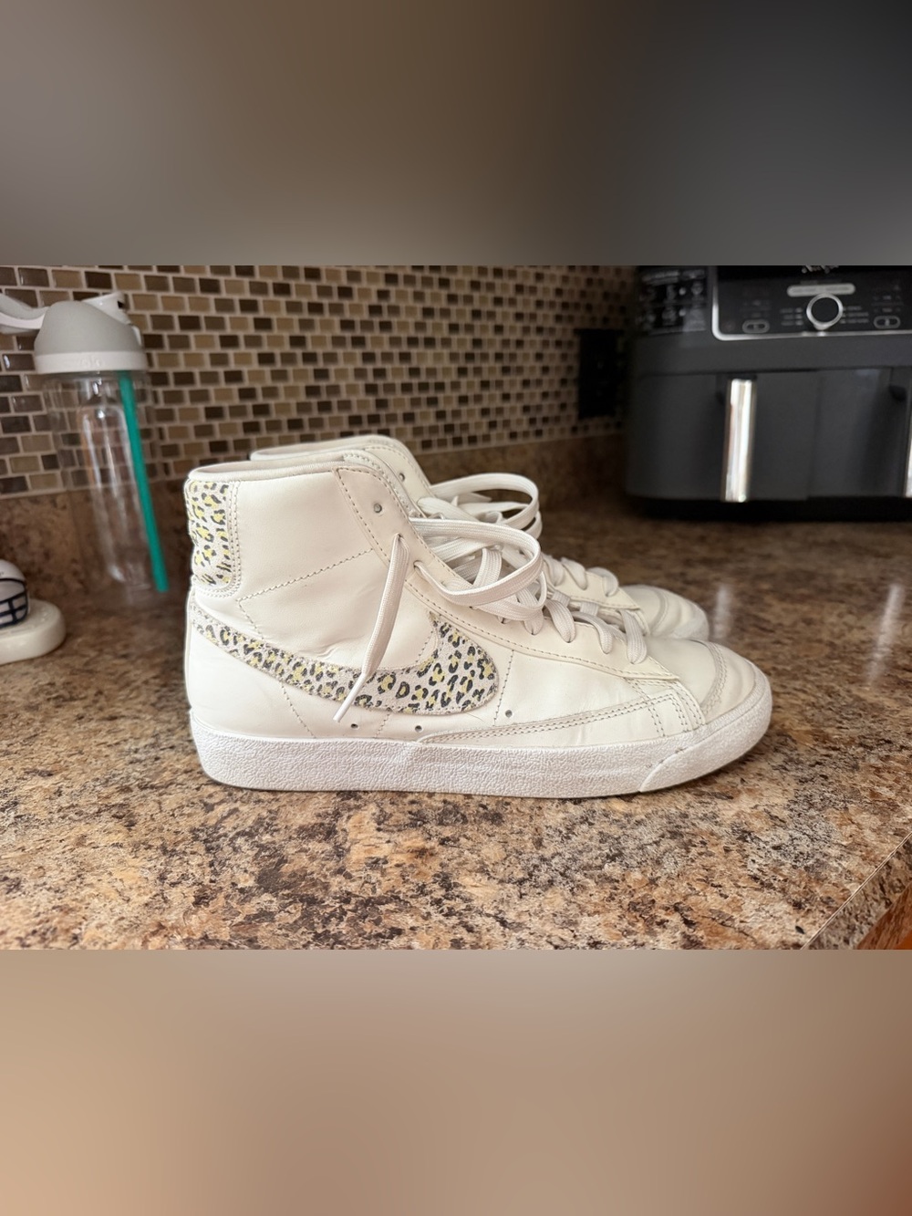 Nike Women’s Cream High-Top Sneakers with Leopard Swoosh